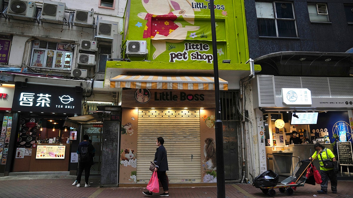 A pet shop is closed after some pet hamsters tested positive for the coronavirus, in Hong Kong, Tuesday, Jan. 18, 2022.