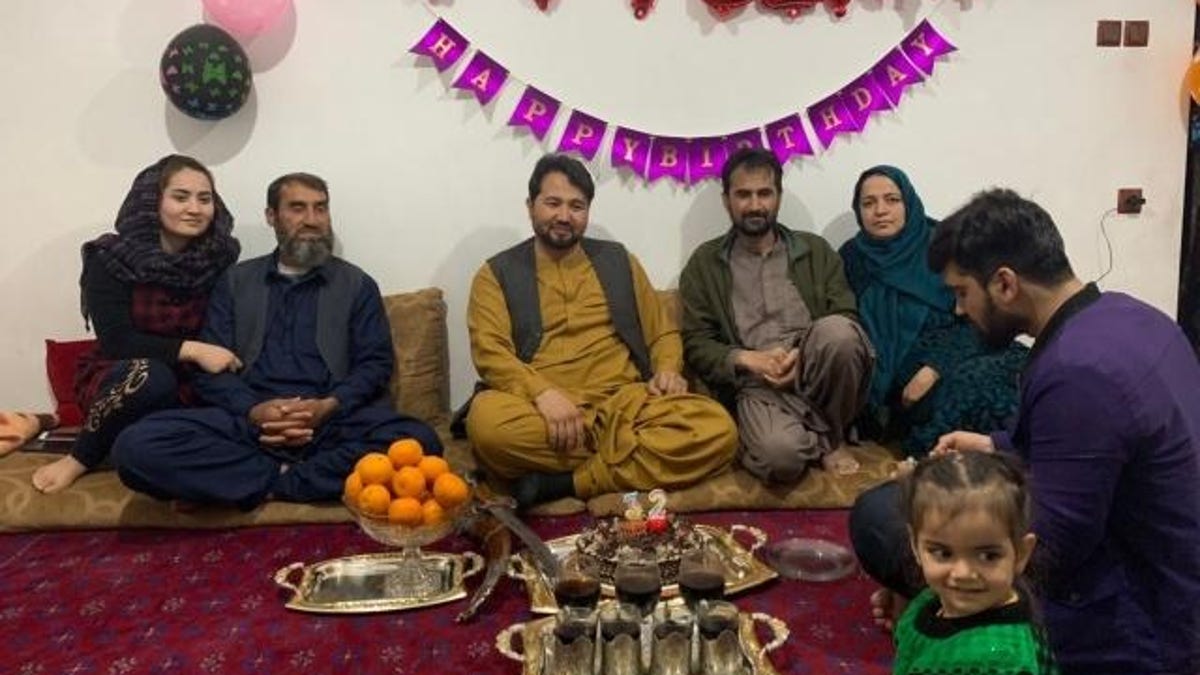 Afghan family celebrates a birthday. Courtesy of Abdullah Rahmatzada