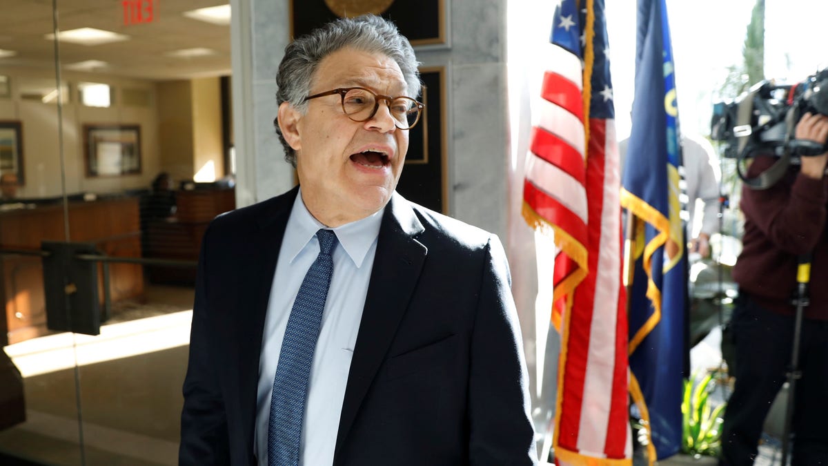 U.S. Senator Al Franken talks to the media outside his office on Capitol Hill in Washington, U.S., November 27, 2017. REUTERS/Yuri Gripas