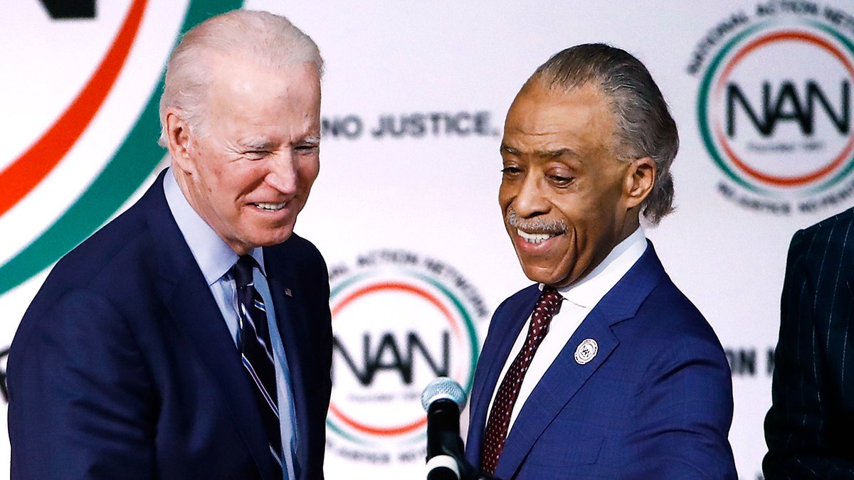 MSNBC host and Harlem, N.Y.-based activist Al Sharpton, right, introduces President Joe Biden in North Charleston, S.C.