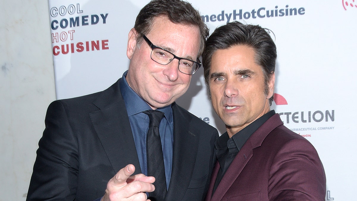 Bob Saget and John Stamos attend Bob Saget's Cool Comedy Hot Cuisine presented by the Scleroderma Research Foundation at the Beverly Wilshire Four Seasons Hotel on April 25, 2019, in Beverly Hills, California. 