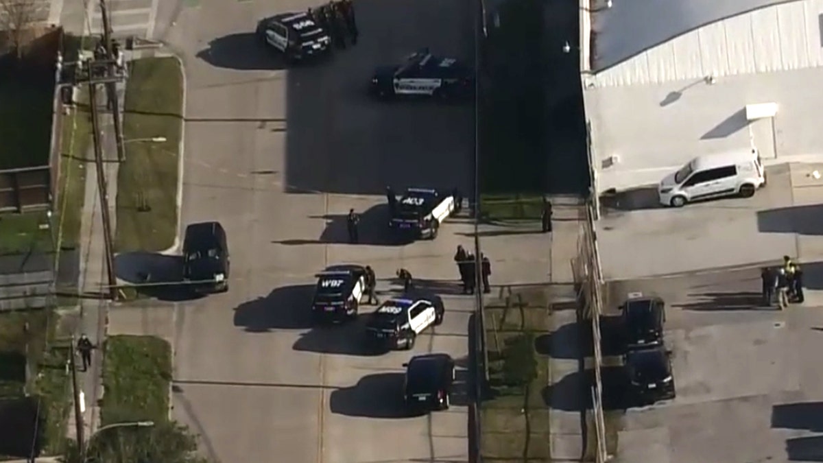 A manhunt got underway in Houston on Thursday afternoon after three police officers were shot, authorities said.