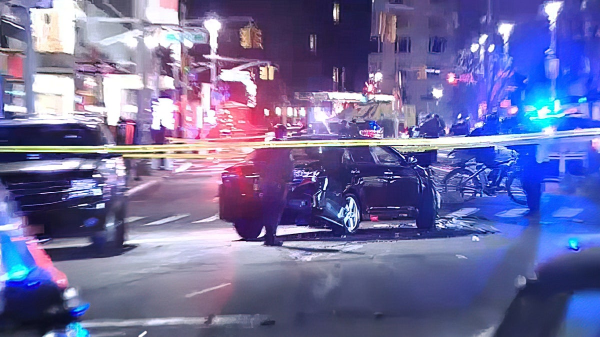 Police at the scene where the suspect in the first carjacking crashed near Columbus Circle in Manhattan.