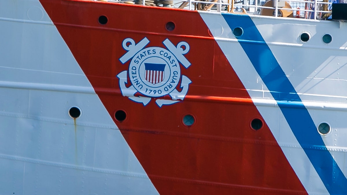 The logo of the United States Coast Guard on the hull of the American sailing training ship Eagle
