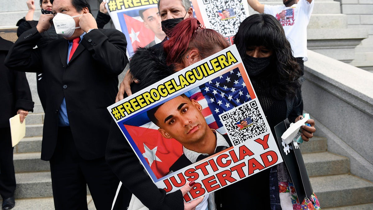 A protester is seen during a rally for truck driver Rogel Aguilera-Mederos on the west steps of the state capitol on Dec. 22, 2021, in Denver, Colorado.