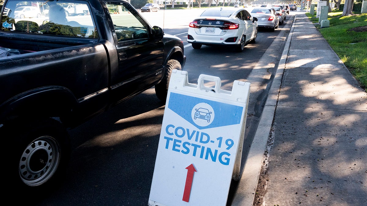 Irvine, CA - January 03: Cars wait in line on Alton Parkway for a COVID-19 test at Kaiser Permanente in Irvine, CA on Monday, January 3, 2022. 