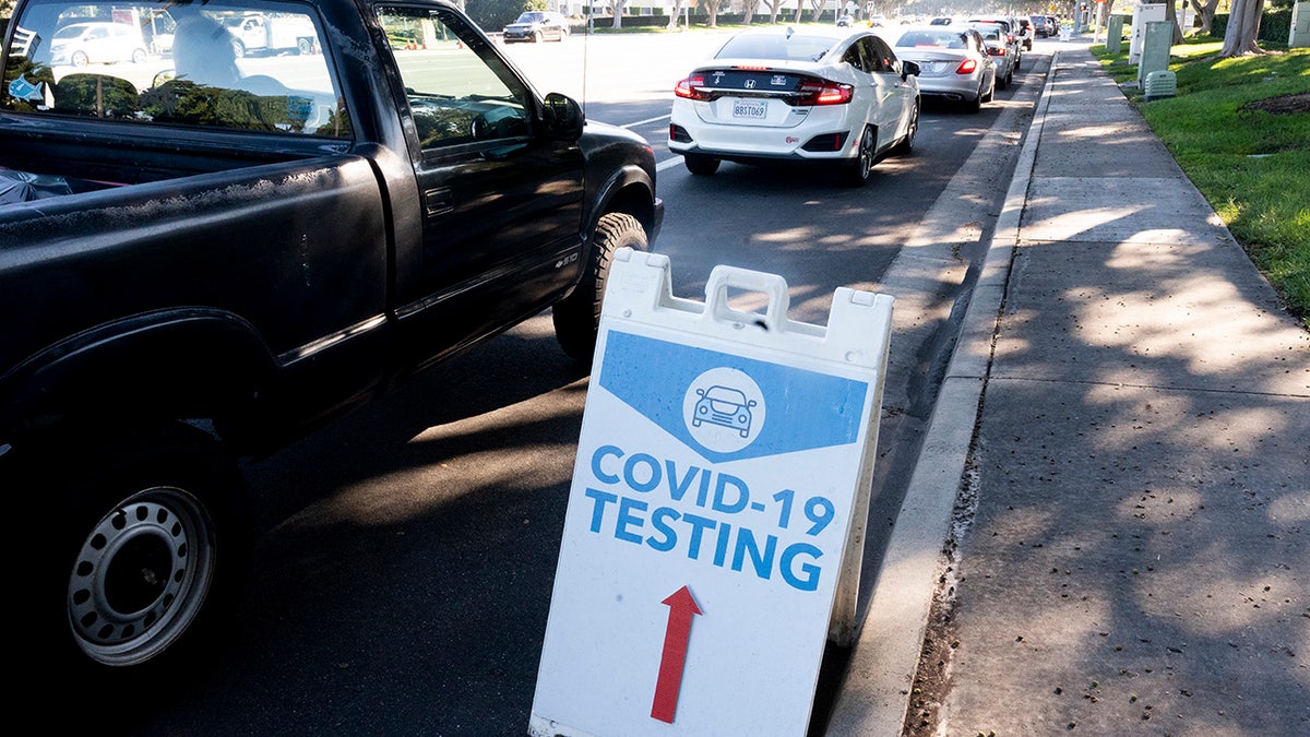 Irvine, CA - January 03: Cars wait in line on Alton Parkway for a COVID-19 test at Kaiser Permanente in Irvine, CA on Monday, January 3, 2022.?