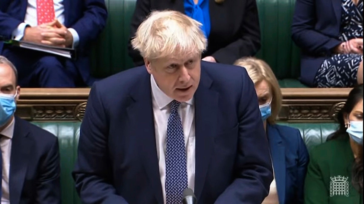 In this grab taken from video, Britain's Prime Minister Boris Johnson makes a statement ahead of Prime Minister's Questions in the House of Commons, London, Wednesday, ?Jan. 12, 2022.?