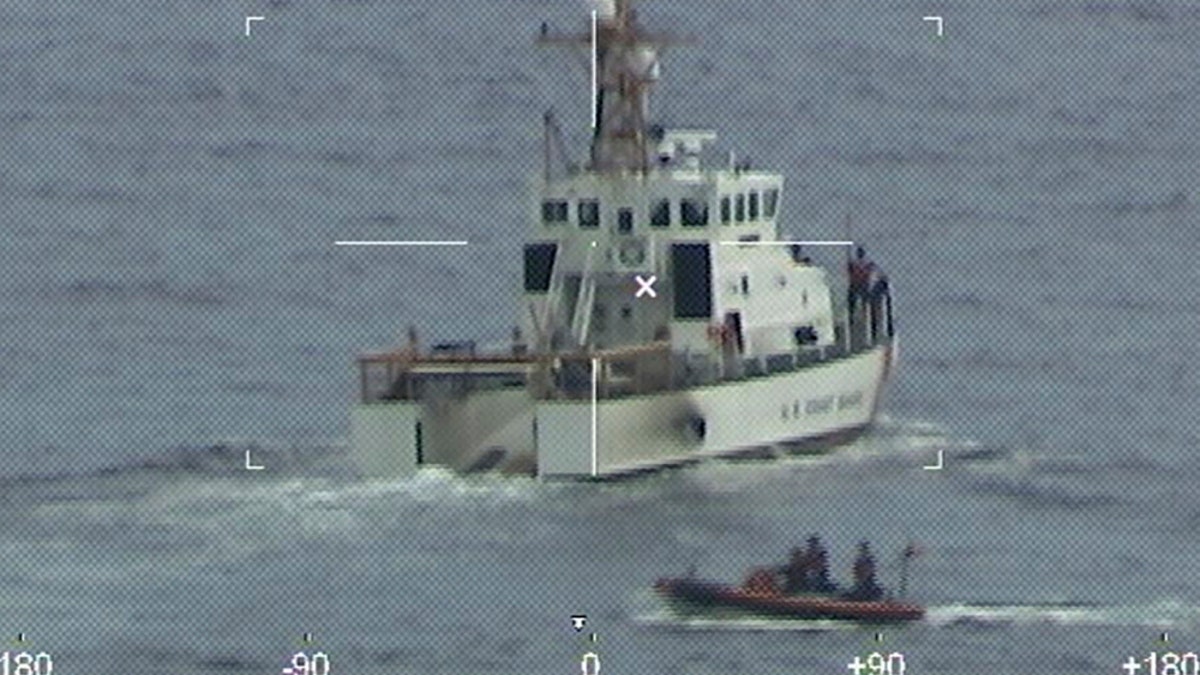 Coast Guard Cutter Ibis' crew searching for people missing from a capsized boat off the coast of Florida, Tuesday, Jan. 25, 2022.?