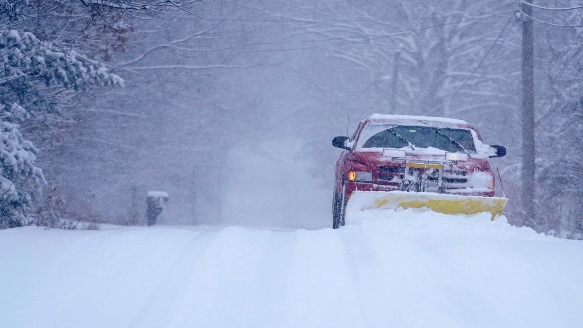 Truck removing snow