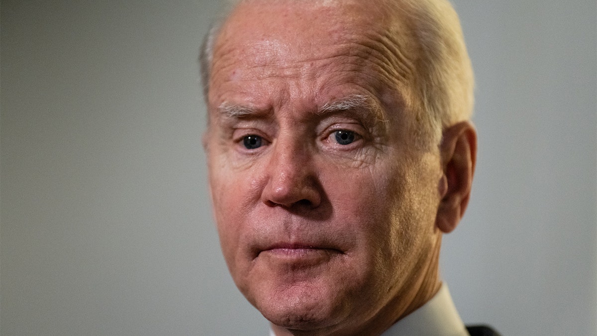 President Biden speaks after exiting a meeting with the Senate Democratic Caucus in Washington, on Thursday, Jan. 13, 2022. 