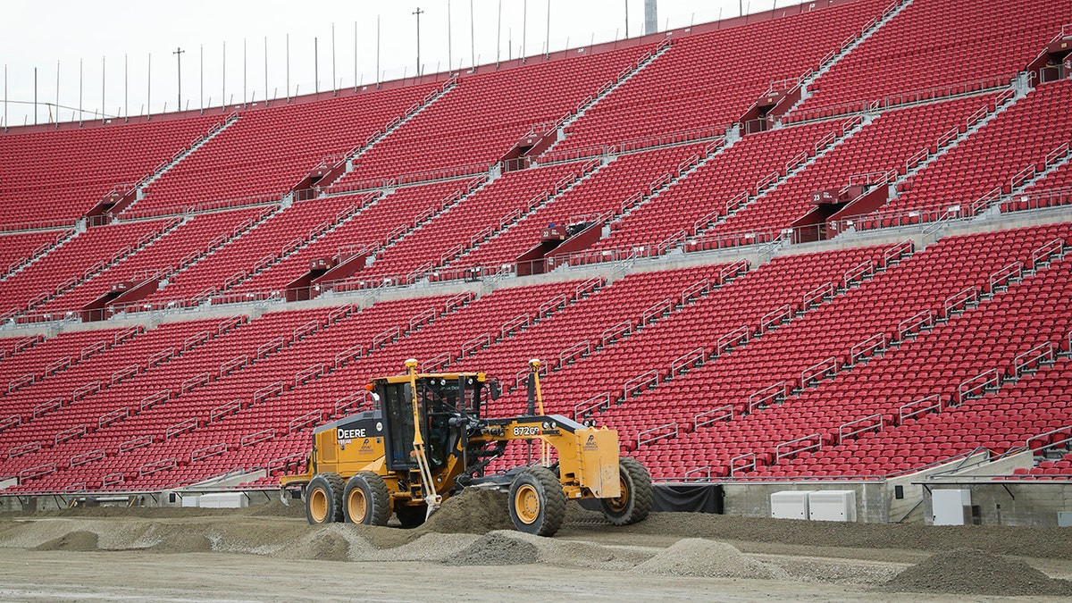 500 truckloads of dirt were required to cover the field.