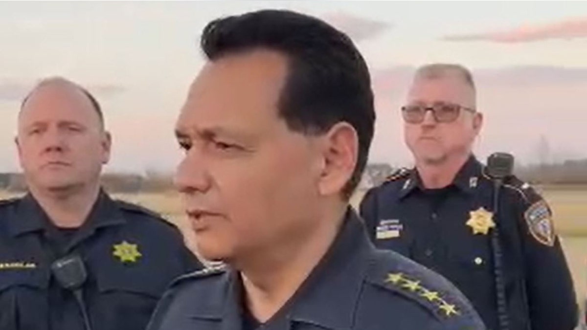 Harris County Sheriff Ed Gonzalez (center) briefs reporters on Jan. 18, 2022.