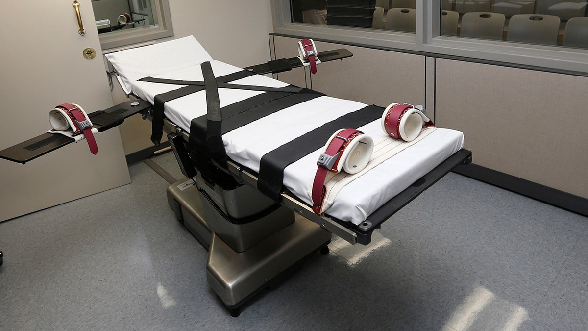 This Oct. 9, 2014, file photo shows the gurney in the execution chamber at the Oklahoma State Penitentiary in McAlester, Oklahoma. 