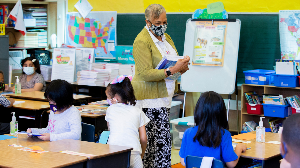 A teacher instructs her second graders ahead of California Gov. Gavin Newsom visiting the classroom at Carl B. Munck Elementary School, Wednesday, Aug. 11, 2021, in Oakland, Calif. (Santiago Mejia/San Francisco Chronicle via Getty Images)