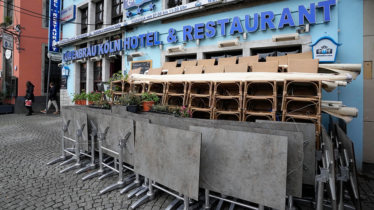 A closed hotel and restaurant is pictured in Cologne, Germany, Friday, Jan. 7, 2022. New corona measures are expected from a meeting of German governors and the federal government today to fight the COVID-19 pandemic.