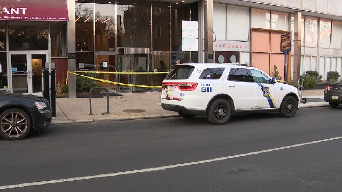 Police respond to an attack Wednesday at a Philadelphia office building.