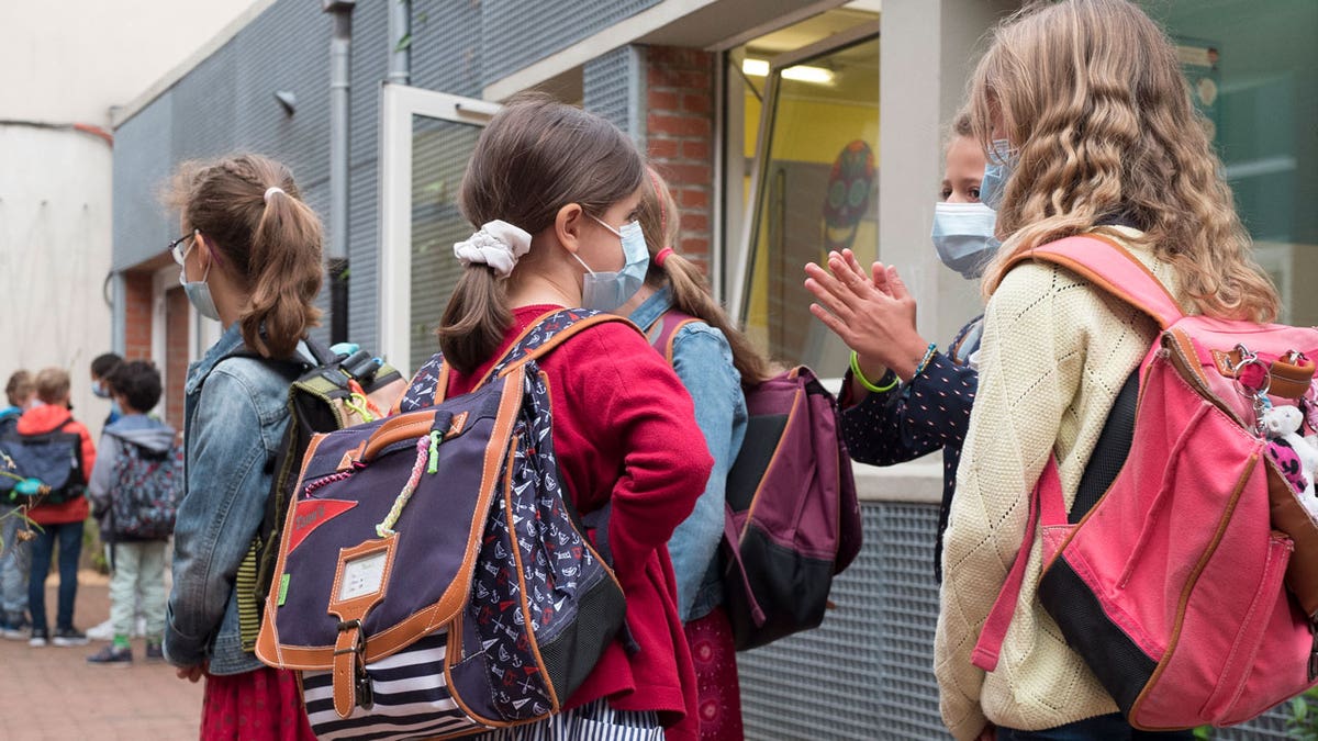 Students attend the first day of school for the 2021-2022 year at Gounod Lavoisier Primary school, Lille, northern France, Thursday, Sept. 2 2021.