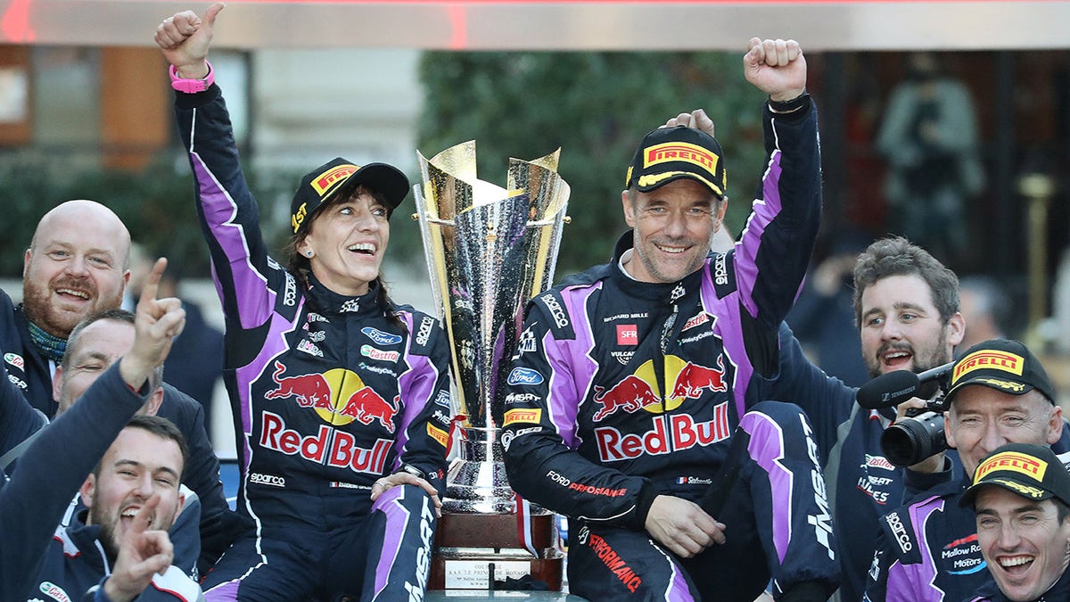 Isabelle Galmiche and Sebastien Loeb celebrated their victory at the Monte Carlo Rally.