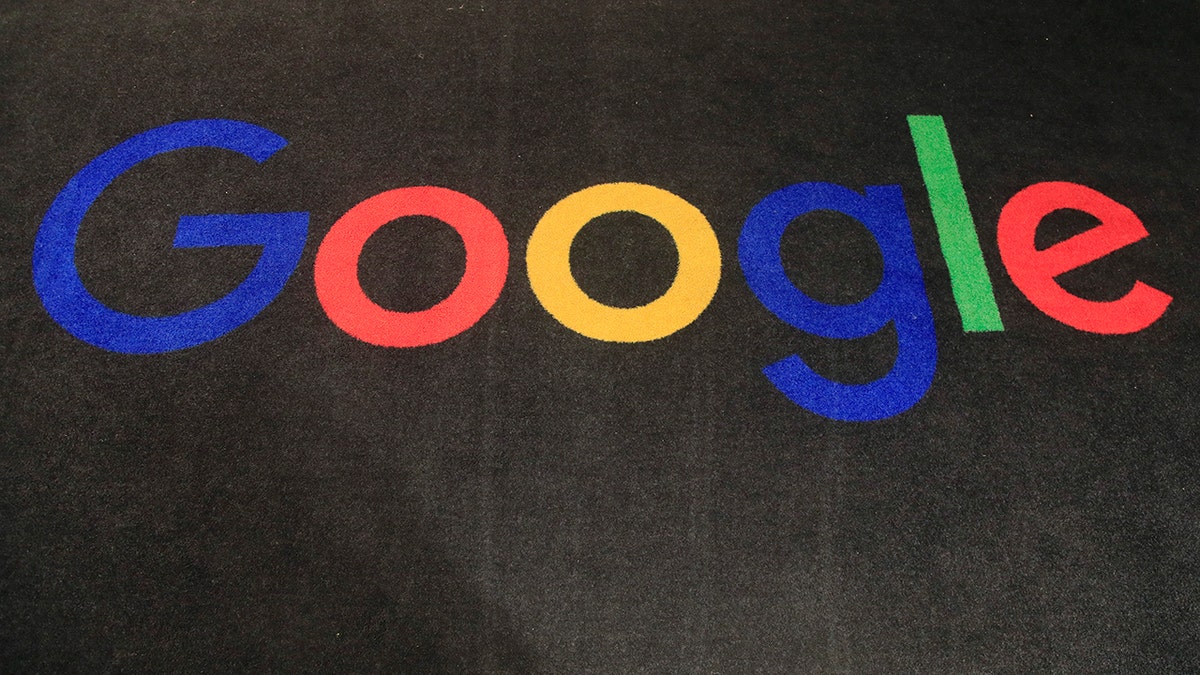 google logo on black carpet