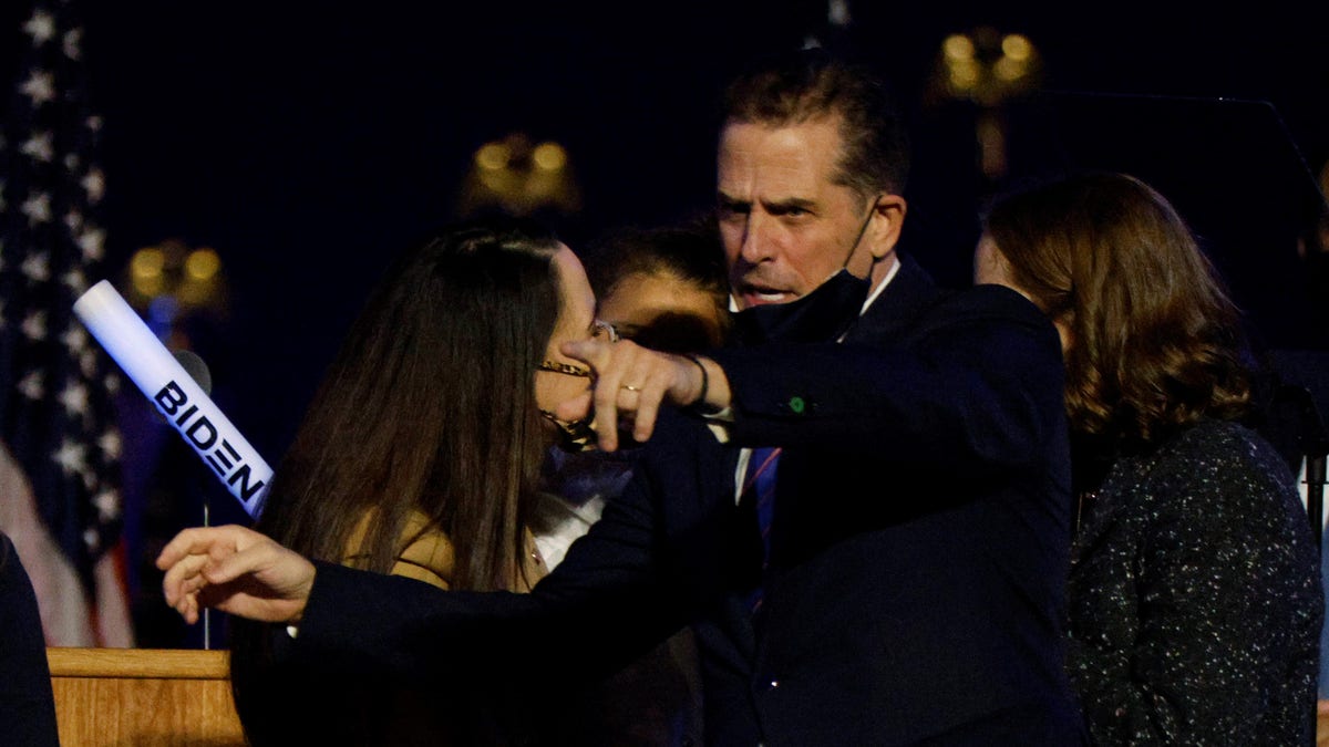 Hunter Biden celebrates onstage at the election rally, after the news media announced that Biden has won the 2020 U.S. presidential election over President Donald Trump, in Wilmington, Delaware, U.S., November 7, 2020. REUTERS/Jim Bourg