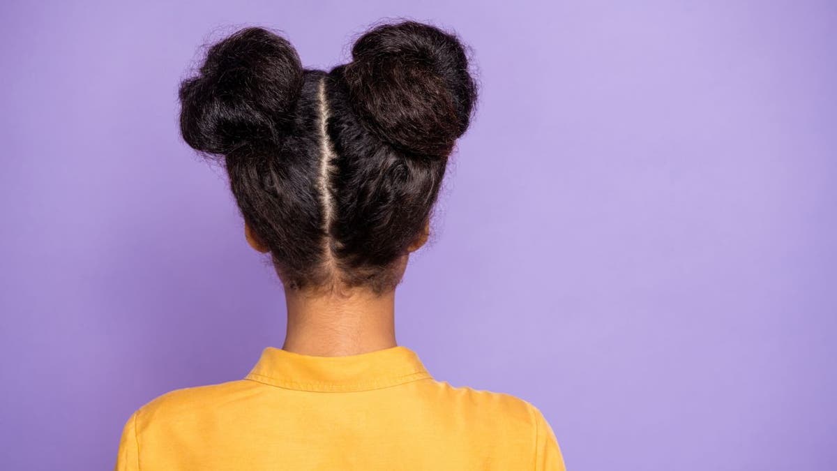 Search queries for 'space buns natural hair' were up 100% in 2021 and Pinterest believes the trend will continue to grow in 2022.