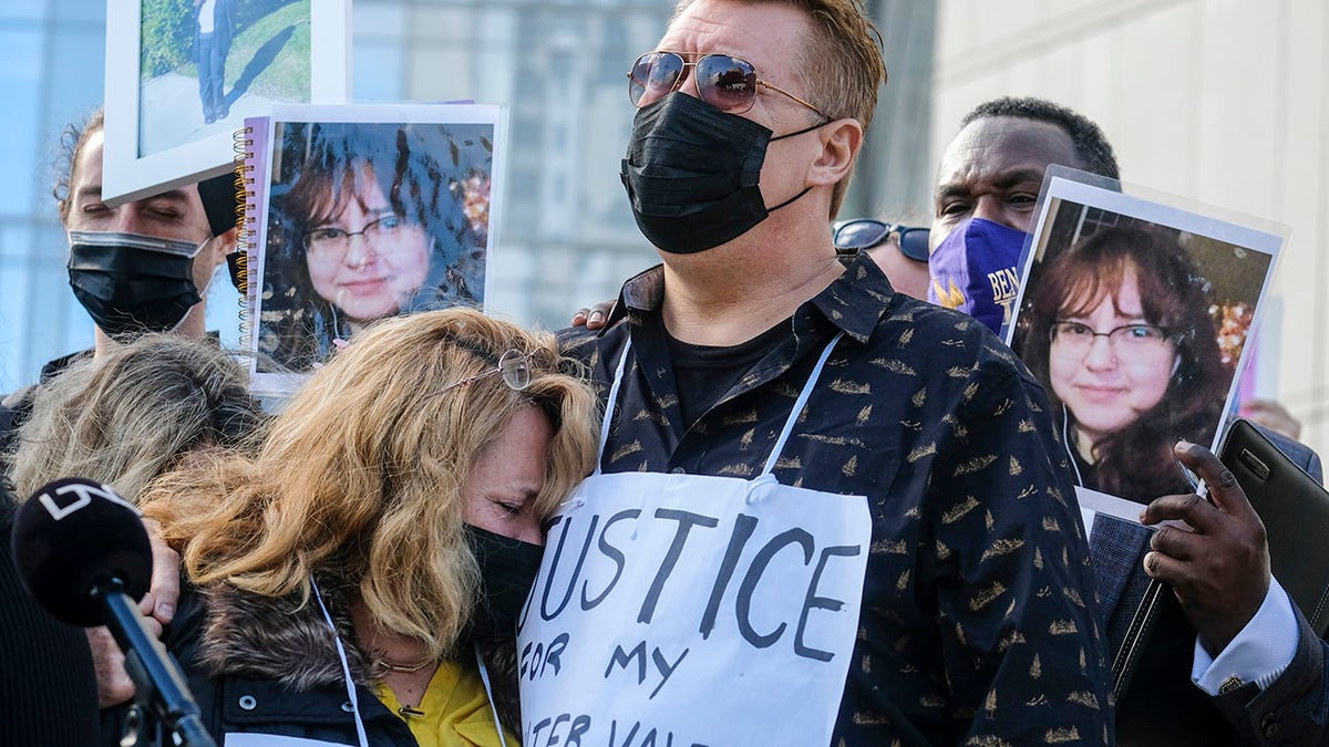 Soledad Peralta and Juan Pablo Orellana Larenas, the parents of Valentina Orellana-Peralta, attend in a news conference outside the Los Angeles Police Department headquarters in Los Angeles, Tuesday, Dec. 28, 2021.