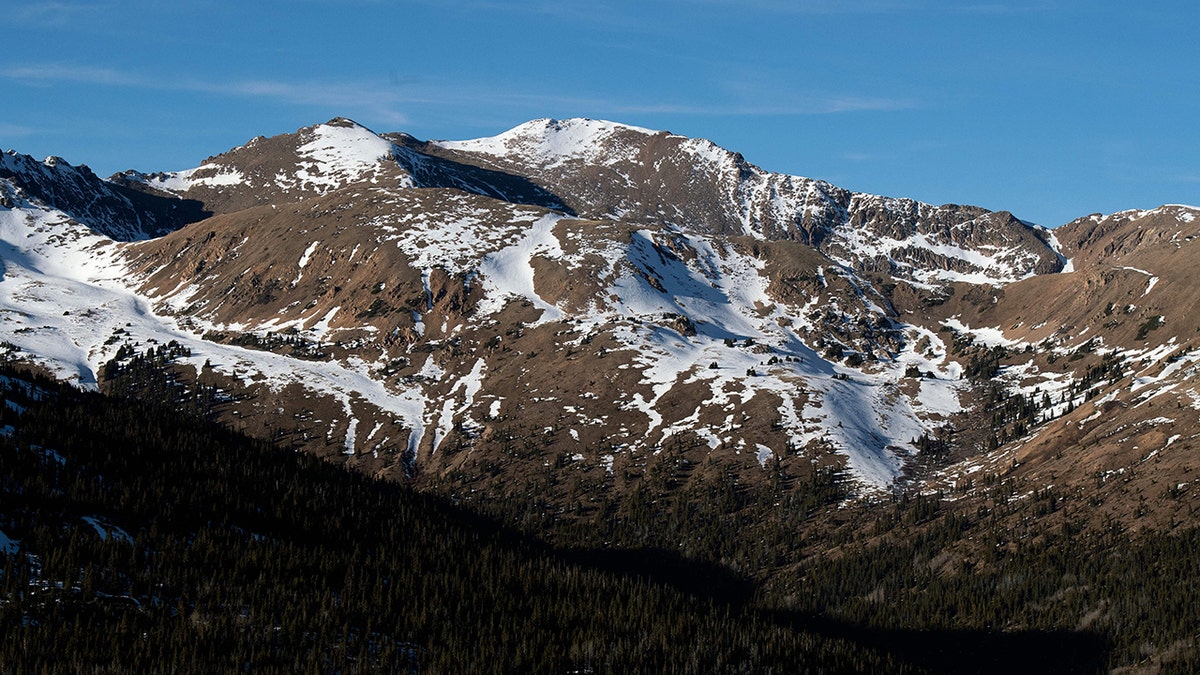 A lack of early season snow leaves mountain peaks in Clear Creek County, Colorado, exposed on Dec. 3, 2021.