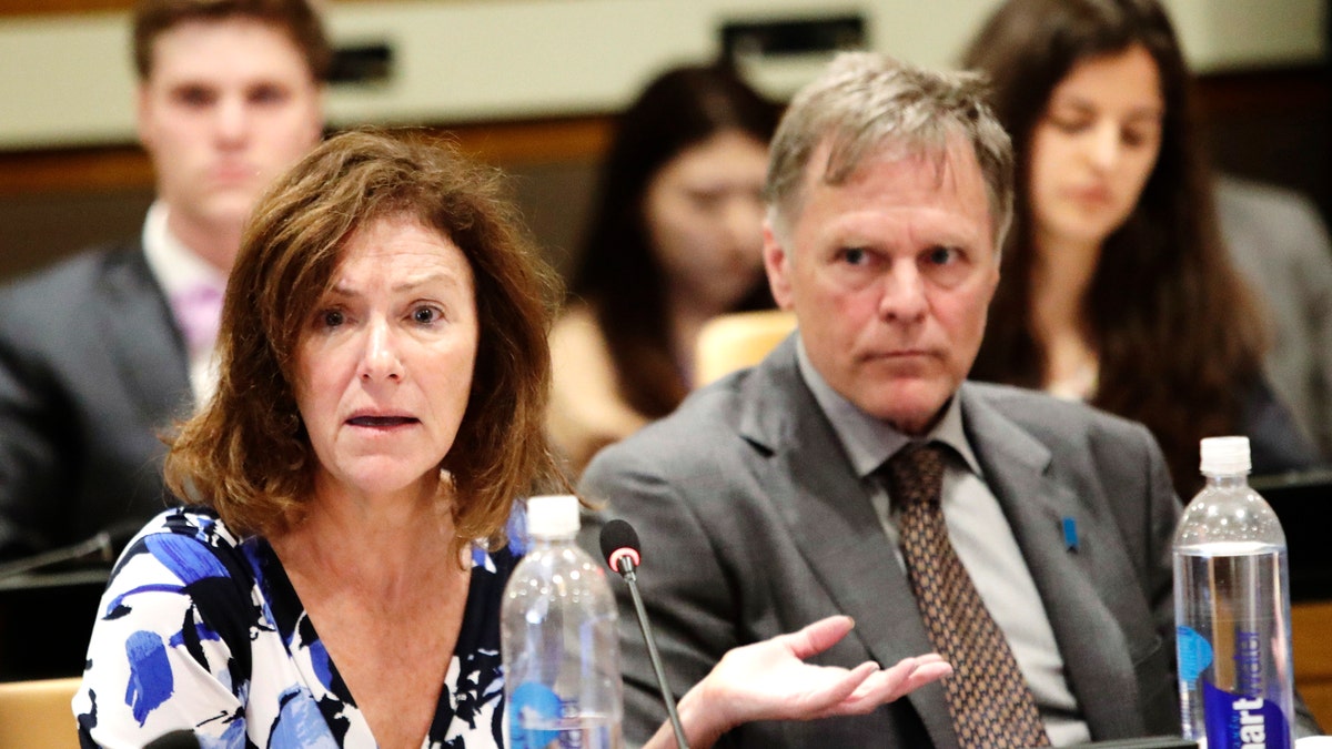 In this May 3, 2018 file photo, Fred Warmbier, right, listens as his wife Cindy Warmbier, speaks of their son Otto Warmbier, during a meeting at the United Nations headquarters. (AP Photo/Frank Franklin II)