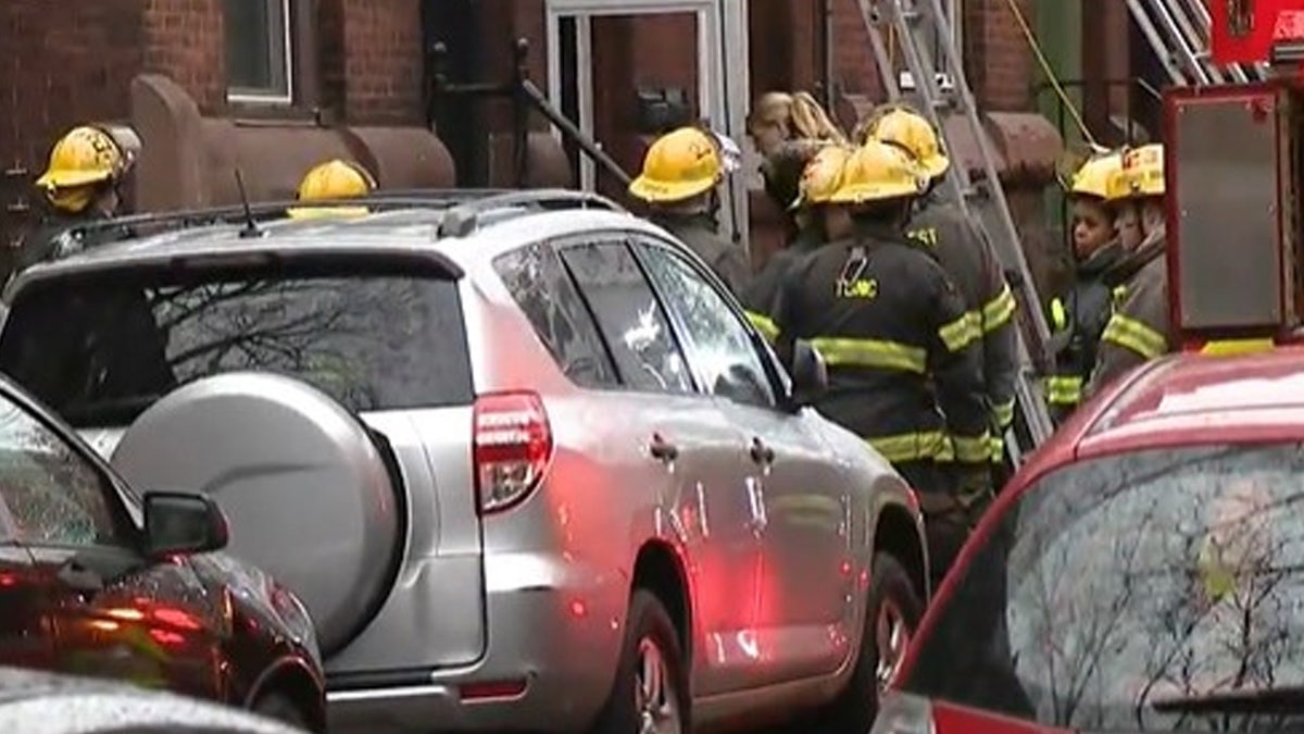 Philadelphia firefighters respond to the scene Wednesday morning.