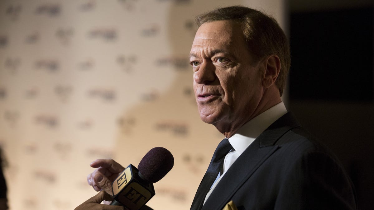 Comedian Joe Piscopo speaks to reporters as he arrives for the Mark Twain prize for Humor honoring Eddie Murphy at the Kennedy Center in Washington October 18, 2015. (REUTERS/Joshua Roberts)