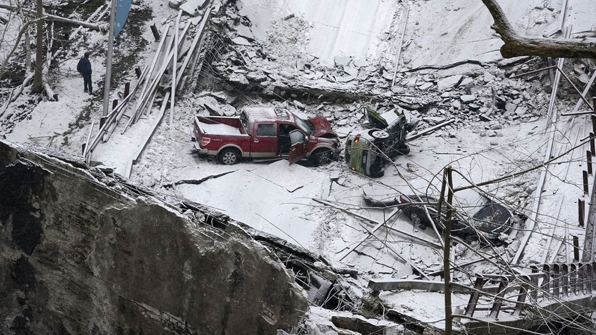 Vehicles that were on a bridge when it collapsed.