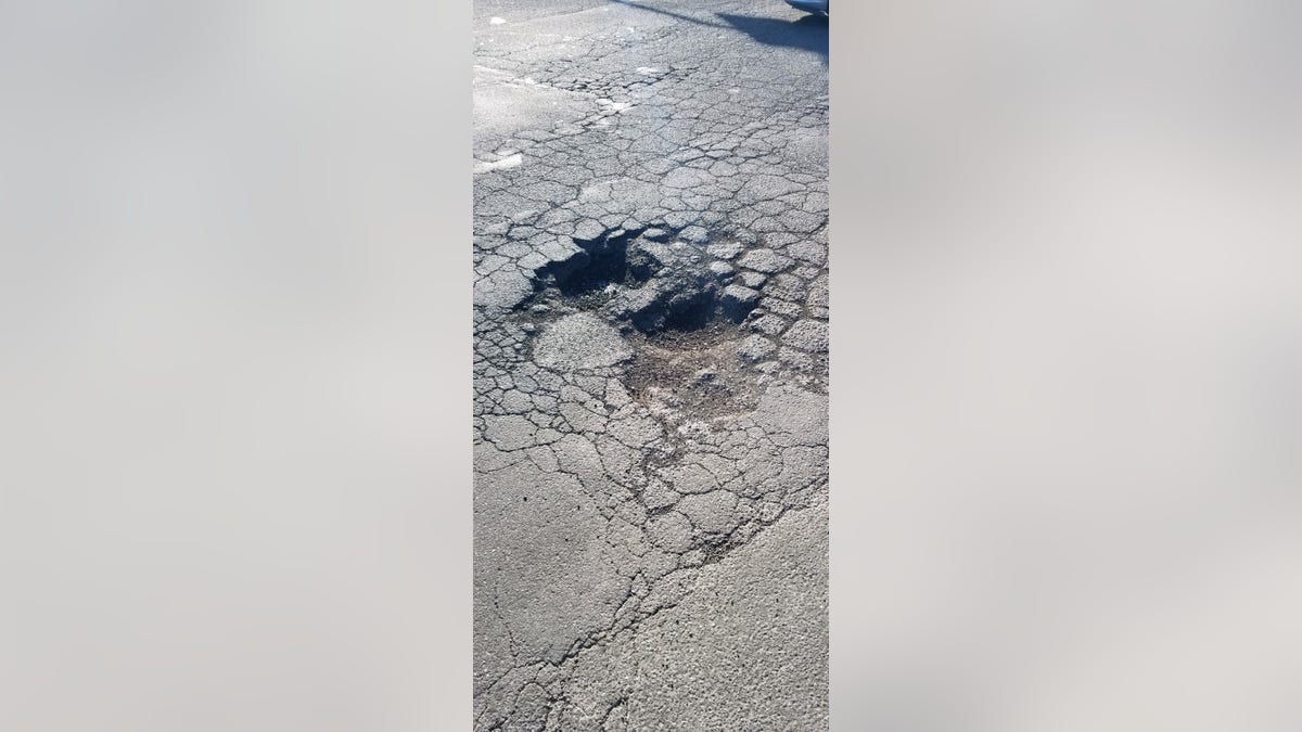 A pothole in Vallejo, California. A group dubbed the "PotholeGate Vigilantes" has taken it upon themselves to patch potholes across the city.