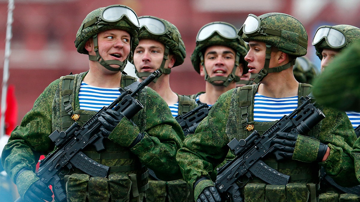 Russian paratroopers march the Victory Day military parade in Red Square marking the 76th anniversary of the end of World War II in Europe in Moscow, May 9, 2021.