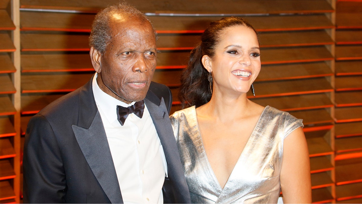 Actor Sidney Poitier and his daughter, actress Sydney Tamiia Poitier, arrive at the Vanity Fair Oscar Party in West Hollywood, Los Angeles, USA, 02 March 2014.