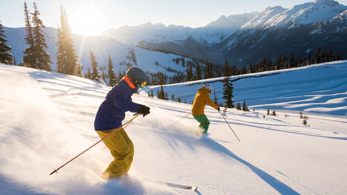 Skiers on a snowy slope