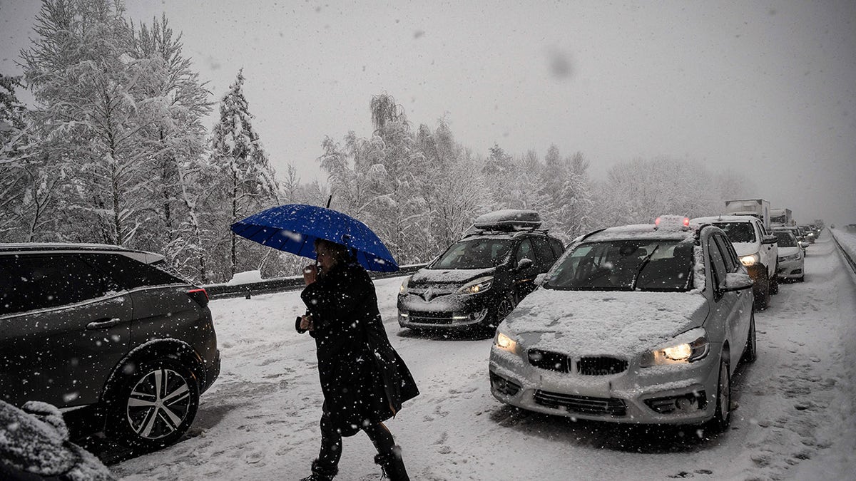 The Red Cross advises against getting out of your car when it's trapped in freezing temperatures.