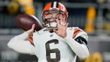 Cleveland Browns quarterback Baker Mayfield (6) warms up before an NFL football game against the Pittsburgh Steelers, Monday, Jan. 3, 2022, in Pittsburgh. Browns general manager Andrew Berry said Tuesday, Jan. 11 the team expects Mayfield to return as its starter next season and rebound after an injury-filled 2021 that raised questions about his future with Cleveland.