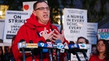 Chicago Teachers Union (CTU) President Jesse Sharkey speaks outside Peirce Elementary School on the first day of a strike by the CTU, on October 17 2019 in Chicago, Illinois. (Photo by KAMIL KRZACZYNSKI / AFP) (Photo by KAMIL KRZACZYNSKI/AFP via Getty Images)