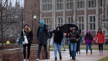 Students walk through campus at Washington University in St. Louis, MO on Wednesday, February 12, 2020. This semester, Chancellor Andrew Martin is co-teaching a class on campus free speech. The class comes at a time when hostility to conservative ideas on college campuses drives deeper the divide between Republicans and higher education, a development with profound implications for both universities and politics.