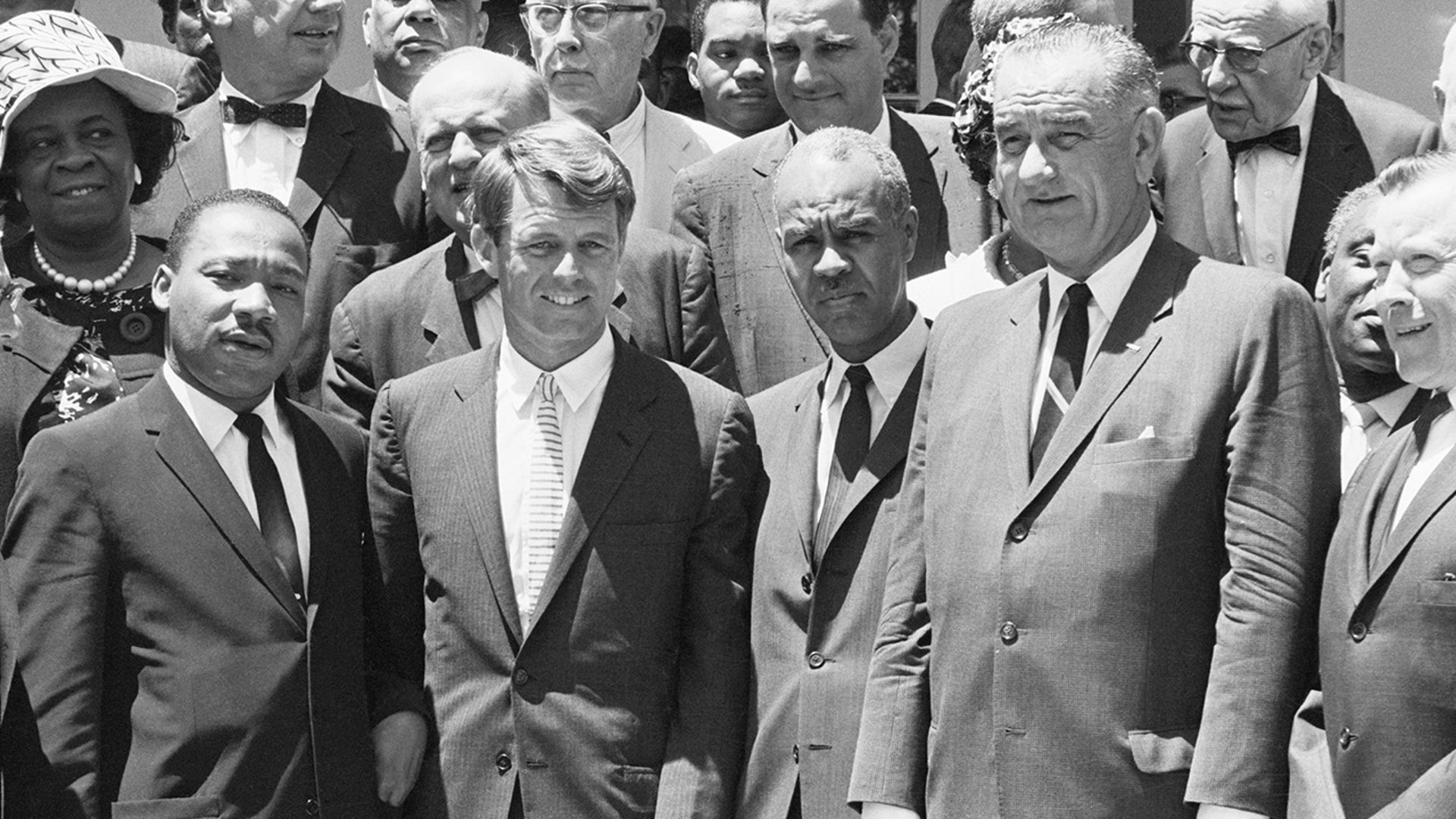Martin Luther King Jr., leader of the Southern Christian Leadership Conference; Attorney General Robert Kennedy; Roy Wilkins, executive secretary of NAACP; and Vice President Lyndon B. Johnson. 
