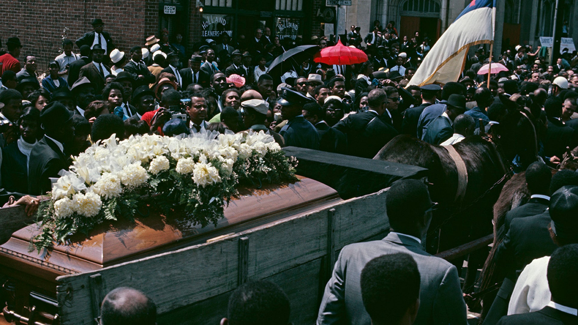 The procession bearing the coffin at the funeral of assassinated civil rights leader Martin Luther King Jr. in Atlanta, Georgia, April 9, 1968. 