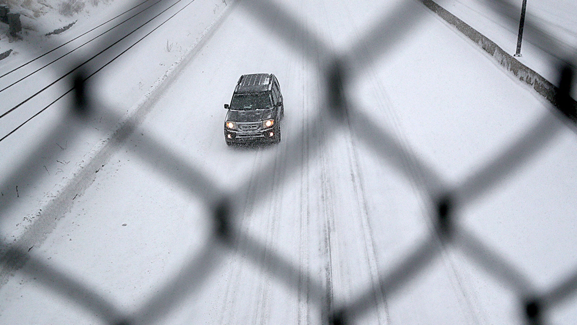 Snow drifts start to get bigger as storm grows stronger in Cohasset, MA on Jan. 29, 2022 in near whiteout conditions.