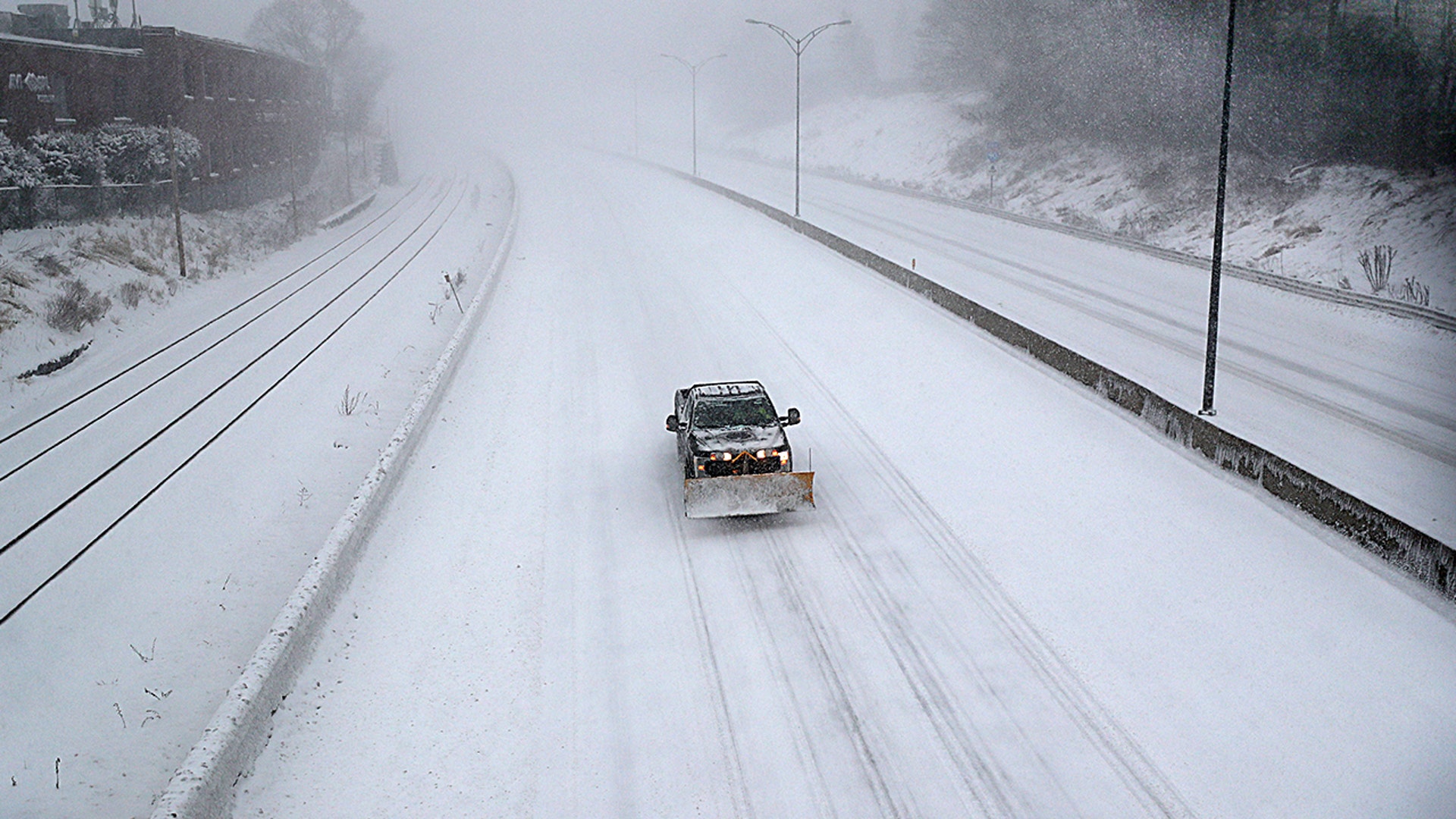 Snow drifts start to get bigger as storm grows stronger in Cohasset, MA on Jan. 29, 2022 in near whiteout conditions.