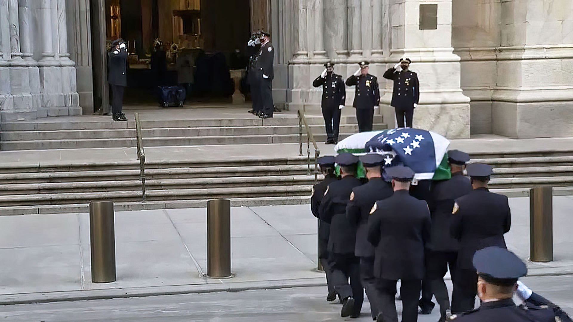 A casket carrying the body of NYPD Officer Jason Rivera body arrives at St. Patrick's Cathedral.
