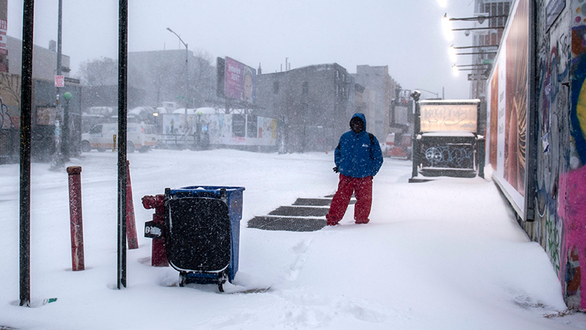 Snow covers the street in the Bushwick section of the Brooklyn borough of New York on Saturday, Jan. 29, 2022.