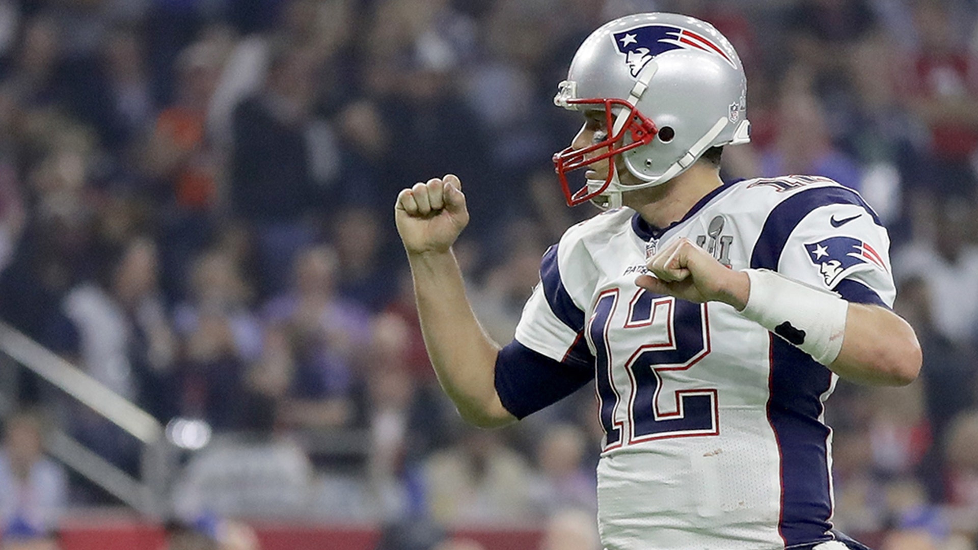 Tom Brady $12 celebrates after Danny Amendola #80 of the New England Patriots catches a six yard touchdown in the fourth quarter against Jalen Collins #32 of the Atlanta Falcons in the fourth quarter during Super Bowl 51 at NRG Stadium on February 5, 2017 in Houston, Texas.