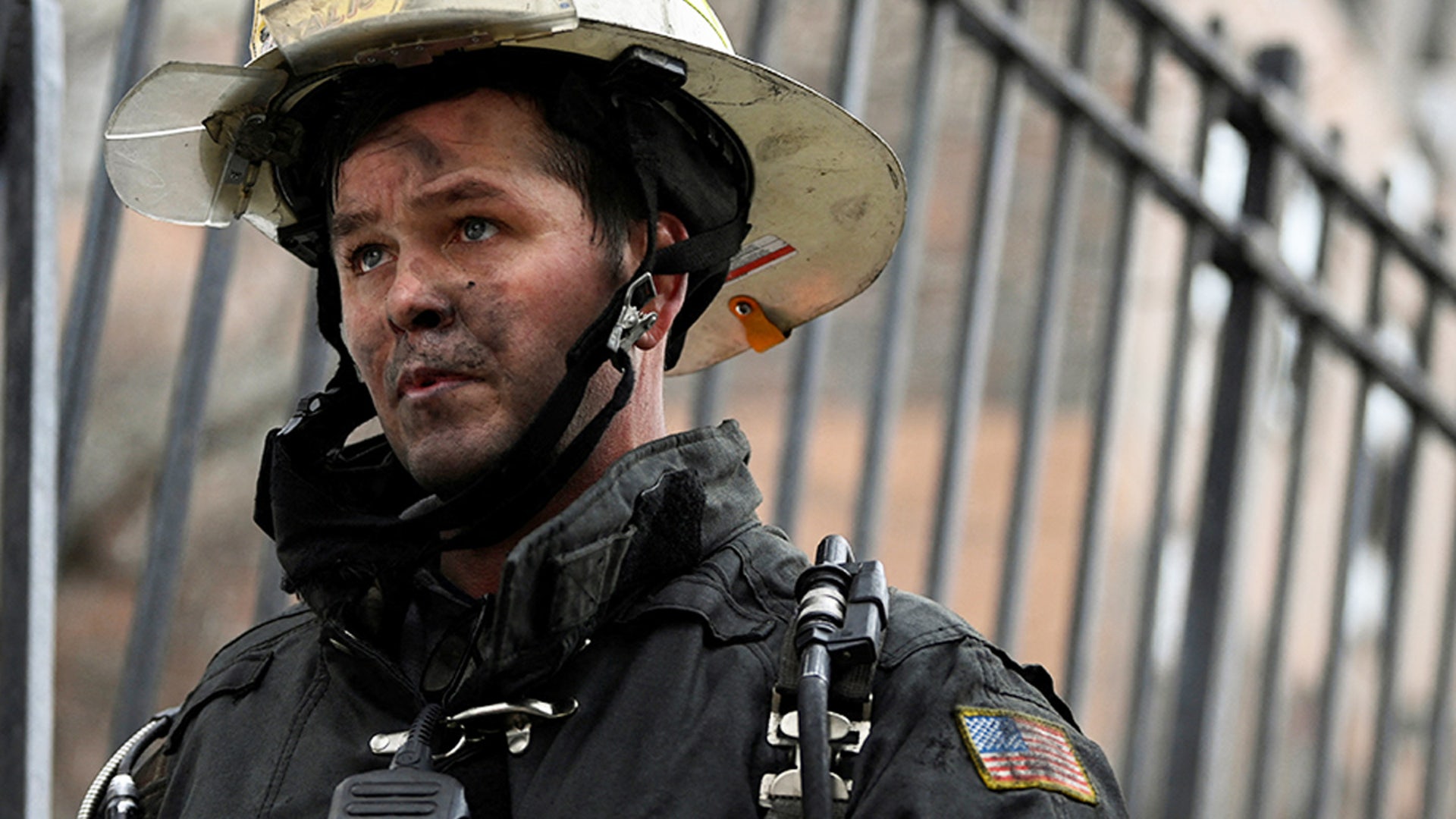A firefighter at the scene of the Bronx apartment fire