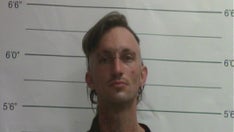 New Orleans police arrest man in relation to frozen dismembered body found on bus