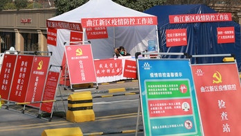 China fires hospital workers when woman miscarries after denied entry to facility: report